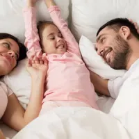 Family in bed bug free bed